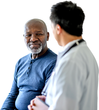 Actor portrayals of a male patient listening to his doctor during a consultation