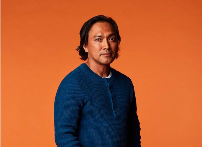 A man standing and looking at camera