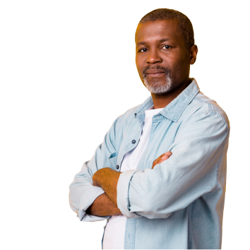 A middle aged man staring confidently at the camera with his arms crossed